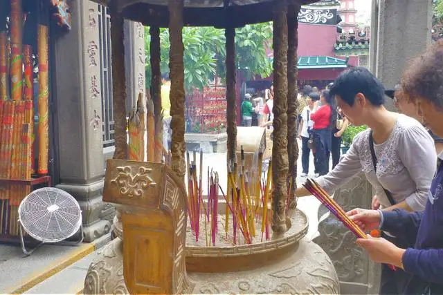 Ancient Traditions Praying at Temples
